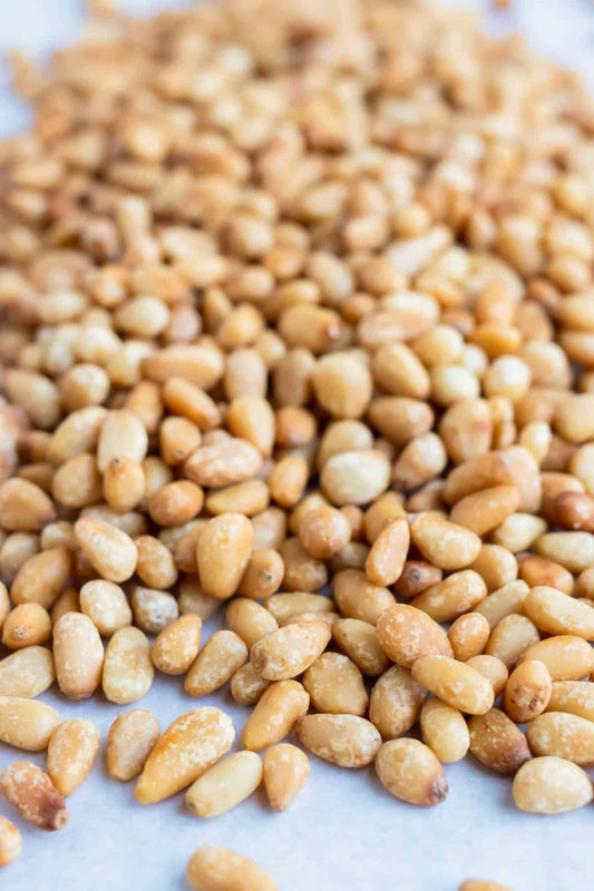 should you roast pine nuts for pesto